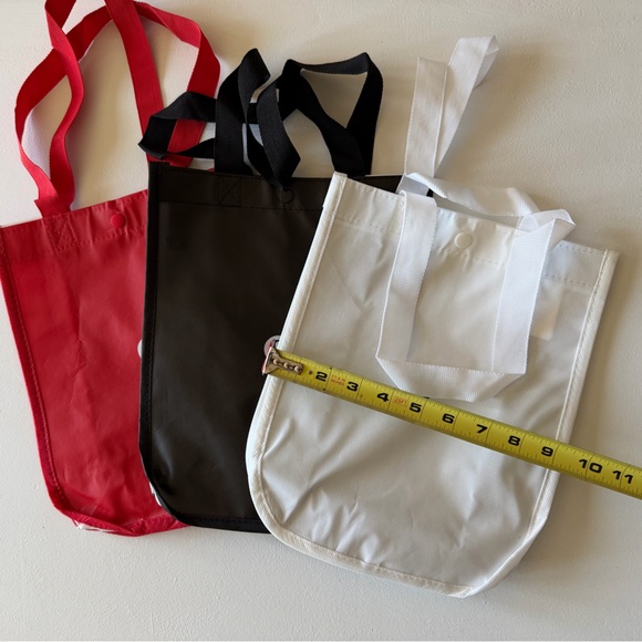 Lululemon shopping bags. Red, Black, and White Tote Bags - Picture 2 of 5